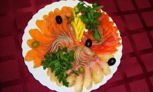 Fish slicing - ideas on how to arrange fish snacks on the festive table