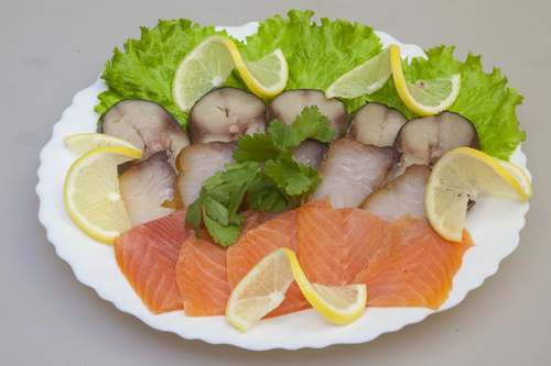 Fish slicing - ideas on how to arrange fish snacks on the festive table