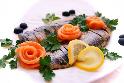 Fish slicing - ideas on how to arrange fish snacks on the festive table