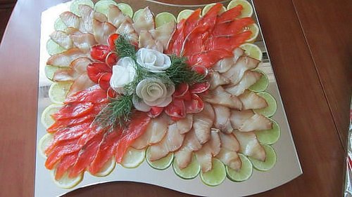 Fish slicing - ideas on how to arrange fish snacks on the festive table