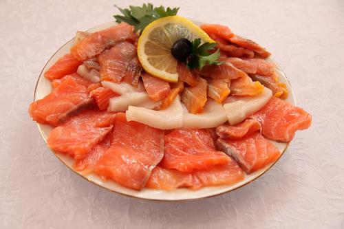 Fish slicing - ideas on how to arrange fish snacks on the festive table