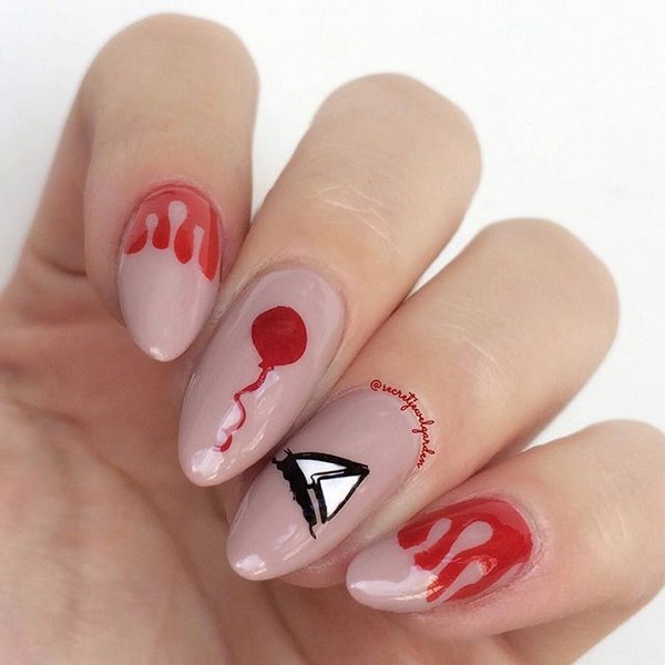 Manicure incomum para o Halloween 2019: idéias espetaculares de design de unhas na foto