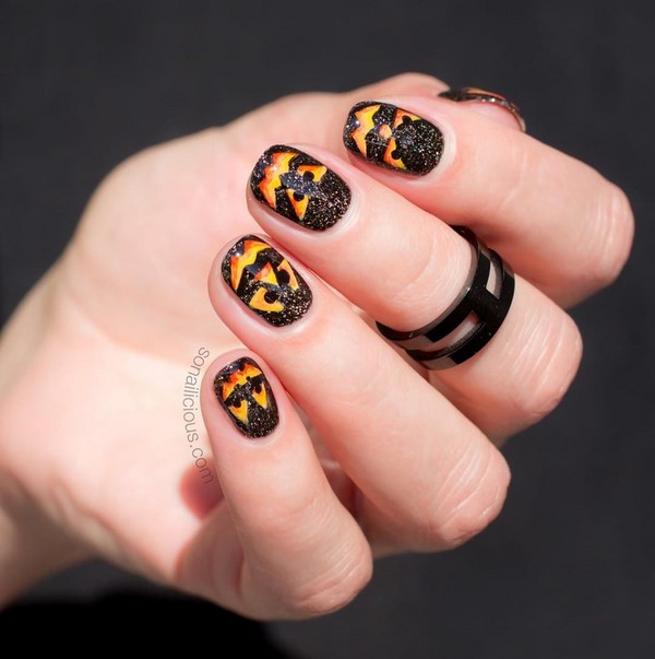 Manicure incomum para o Halloween 2019: idéias espetaculares de design de unhas na foto